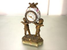 A French lady's gilt-metal and porcelain dressing table clock, c. 1900, in 18th century style, the