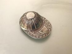 A silver jockey's cap caddy spoon, Francis Howard, Sheffield, 1964, the cap engraved with a monogram