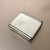 An engine-turned enamel and silver cigarette case in the Art Deco taste, Adie Brothers, Birmingham