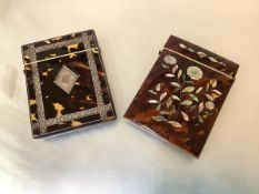 Two 19th century tortoiseshell card cases: the first inlaid in mother-of-pearl with a floral spray