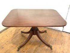 A George IV plum pudding mahogany tilt-top breakfast table, the well-figured rectangular top with