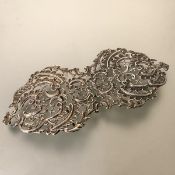 A late Victorian silver belt buckle, William Comyns & Sons, London 1896, pierced, cast with