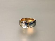 Georg Jensen, a striking single stone diamond, 18ct gold and platinum ring, the round brilliant