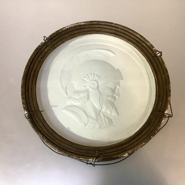 A late 19th century plaster roundel, a portrait bust in relief of Robert the Bruce, portrayed in