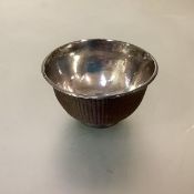 An unusual woven fibre bowl, possibly Japanese, with white metal liner. Diameter 9.75cm