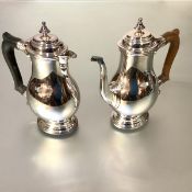 A George VI silver coffee pot and hot water jug, Walker & Sharp, Edinburgh 1938 and 1939, each in