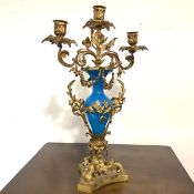 A gilt-metal mounted turquoise glass candelabrum in the Louis XV taste, c. 1900, the three lights