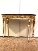 A Neoclassical style parcel-gilt and cream-painted demi-lune console table, late 20th century, the