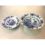 An 18th century blue and white Delft bowl, probably Dutch, with broad lip, the interior painted with