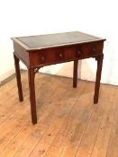 A George III style leather-inset mahogany writing table, early 20th century, the rectangular top