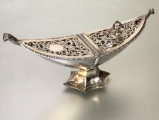 A George V silver pot pourri, Birmingham 1924, of navette form, the pierced cover half-hinged and