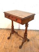 A Victorian rosewood work table, the rectangular moulded top over a single frieze drawer, raised