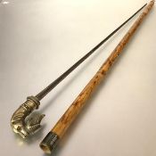A bamboo sword stick, the handle modelled in brass as a hound with pheasant in it's mouth, with