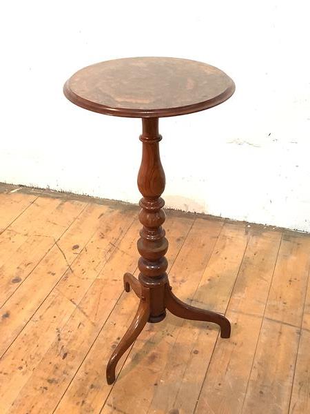 A Victorian walnut occasional table, the circular moulded burr top raised on a baluster turned