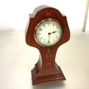 An inlaid mahogany mantel clock in the Art Nouveau taste, c. 1910, the case of balloon shape