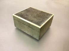 An ivory-mounted shagreen cigarette box, c. 1930, of plain oblong form. 5.5cm by 11.5cm by 10.5cm