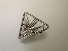 Georg Jensen, a Danish sterling silver dolphin and bulrush triangular brooch, design no. 257, by