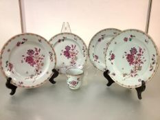A set of four Chinese Export porcelain plates, each painted with puce floral sprays; together with a