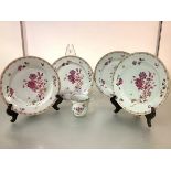 A set of four Chinese Export porcelain plates, each painted with puce floral sprays; together with a