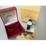 Omega, a gentleman's 9ct gold wristwatch, the silvered dial of oblong "tv" shape with baton markers,