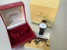 Omega, a gentleman's 9ct gold wristwatch, the silvered dial of oblong "tv" shape with baton markers,