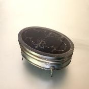 A George V silver and tortoiseshell jewellery box, Birmingham 1919, of oval form, with scroll and