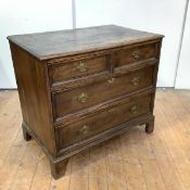 A small vernacular oak chest of drawers, mid/late 18th century, the moulded top over two short and