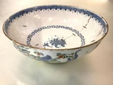 An English Delft punch bowl, third quarter of the 18th century, probably Lambeth, the exterior