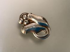 Georg Jensen, a sterling silver brooch, modelled as a tulip with berries, design no. 100, bearing