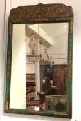 A gilt lacquer decorated fretwork mirror in 18th century style, early 20th century, the crest with