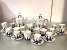 A Spode double coffee service, 1930's, pattern no. Y7940, decorated with powdered blue and gilt