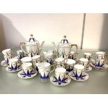 A Spode double coffee service, 1930's, pattern no. Y7940, decorated with powdered blue and gilt