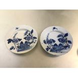 A pair of 18th century blue and white Delft plates, probably London (Lambeth), each decorated with