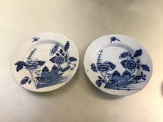 A pair of 18th century blue and white Delft plates, probably London (Lambeth), each decorated with