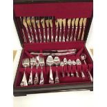 A cutlery canteen with a set of eight knives, forks, spoons, serving utensils etc. (canteen: 9cm x