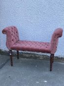 A Victorian style scroll arm window seat upholstered in a deep buttoned and studded velvet, raised