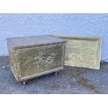 A hammered brass coal box, the exterior decorated with coaching scenes, the hinged lid revealing a