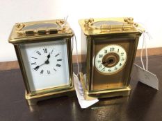A small late 19thc brass and four glass carriage clock, the white enamelled dial with roman