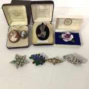 A mixed lot of brooches including two shell cameos, both mounts marked 800 (larger: 4.5cm), a floral