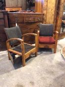 A pair of early 20thc Art Deco period satin birch framed open armchairs, with upholstered back and