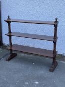 A Victorian mahogany three tier etergere, each tier of rectangular form with rounded corners, raised