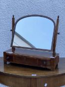 A George III and later mahogany dressing table swing mirror, the associated arched mirror with