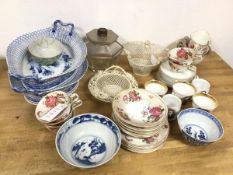 A mixed lot of china, including pierced bowls, teacups, milk jug, saucers, Chinese blue and white