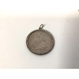 An 1889 Victoria crown in a white metal pendant (combined: 33g)