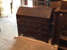 A 19thc mahogany bureau, the fall front enclosing an arrangement of drawers and pigeonholes above