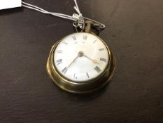 An early 19thc gilt metal pair cased verge fusee open faced pocket watch with white enamel dial