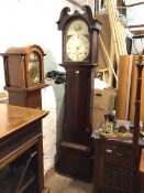 An early 19thc mahogany longcase clock with unusual painted dial, roman numerals and depiction of