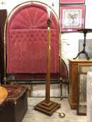 An early 20thc Art Deco period oak floor lamp, the square tapered upright on a stepped square