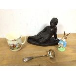 A mixed lot including a composition figure of a Girl Reclining (15cm), a Beswick figure of Peter