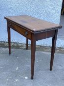 An early 19thc George III tea table, the foldover top supported by two swing legs, above a